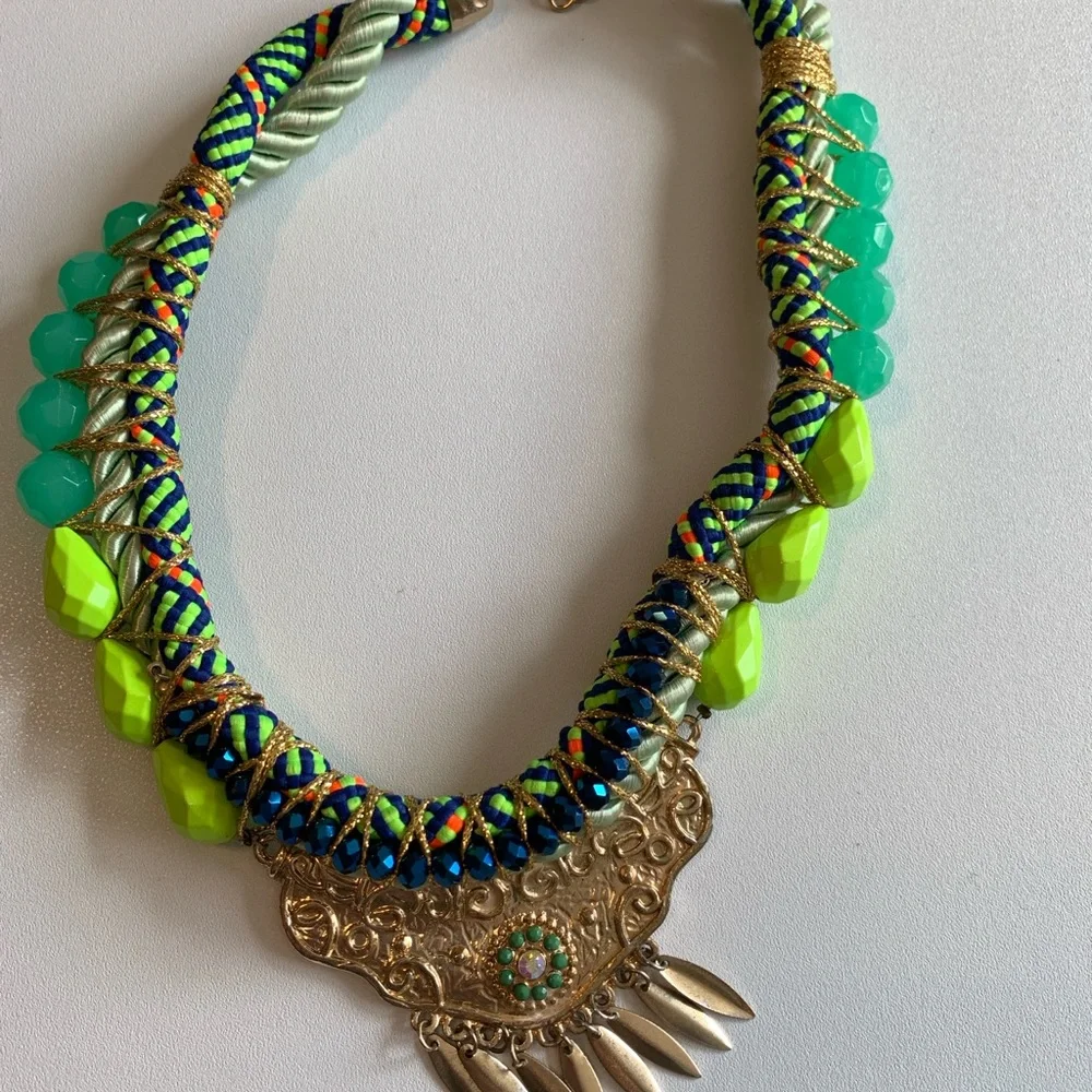 Unique hand made bib necklace in vibrant colors with mixed media.